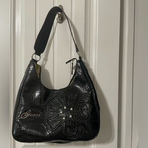 Guess black shiny shoulder bag.
